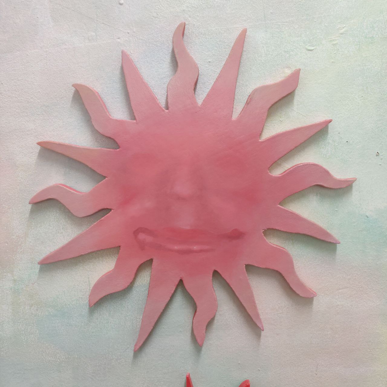 Oil painting on shaped wood by Tejzt – A radiant sun-like entity with a human face subtly emerging from its surface. Its features seem to dissolve into the glowing structure, turning inward as if embodying self-illumination and introspective radiance.